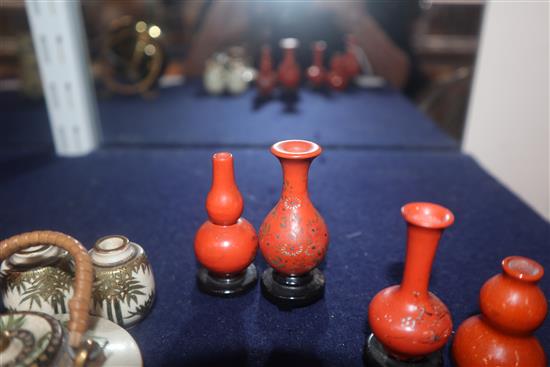 A group of four Chinese lacquer wood miniature vases and a similar pottery double gourd vase (5)